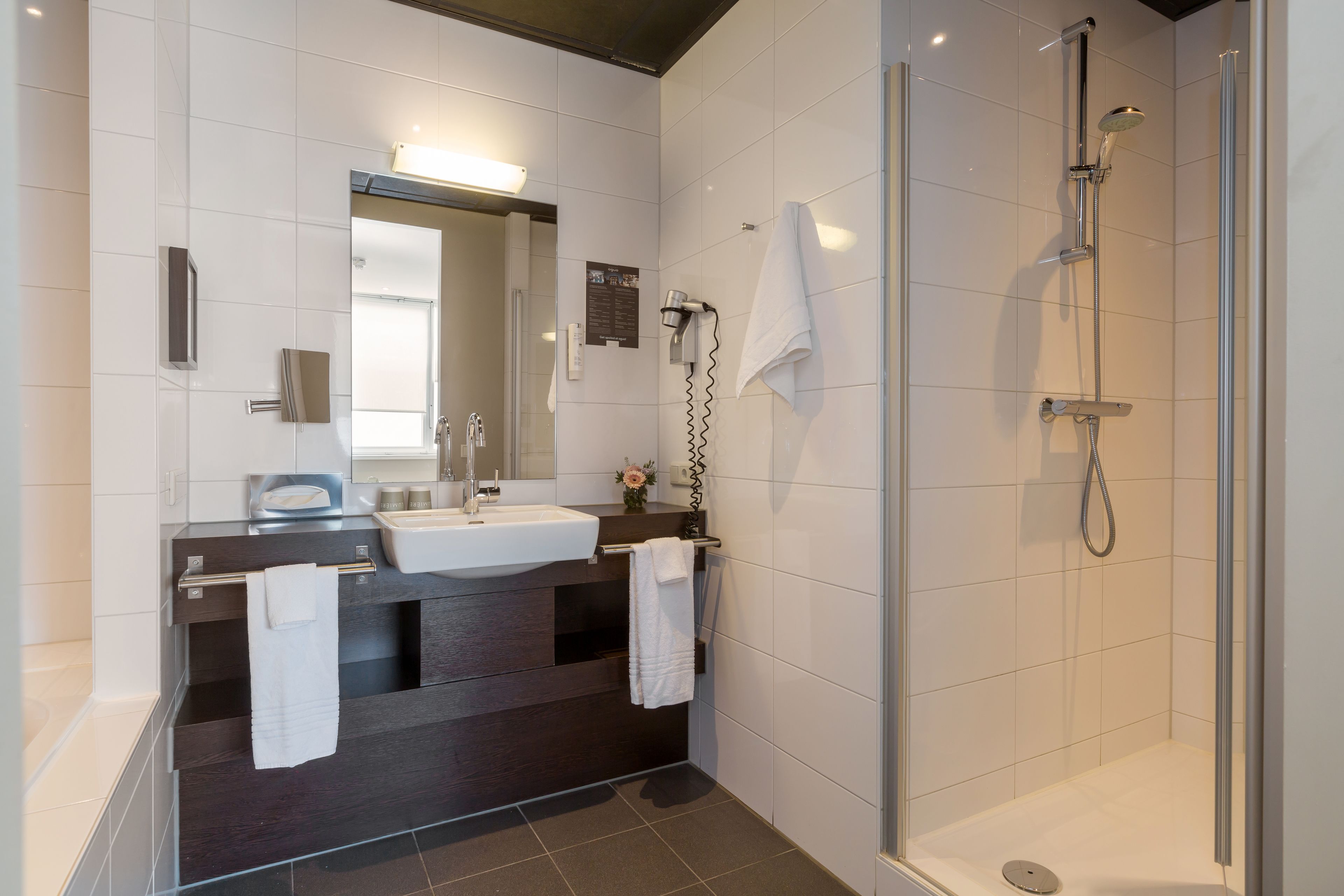executive room | bathroom | designer toiletries, hair dryer, towels, soap