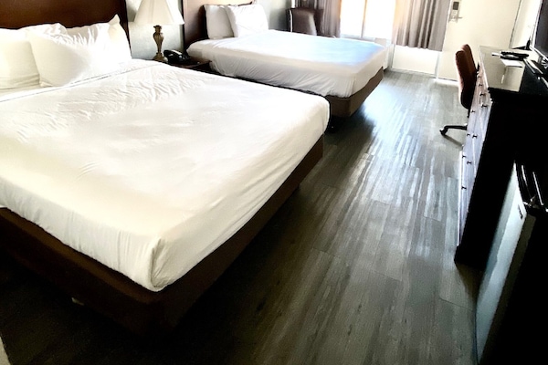 Standard Room, 2 Queen Beds, Non Smoking | Pillowtop beds, desk, free WiFi, bed sheets