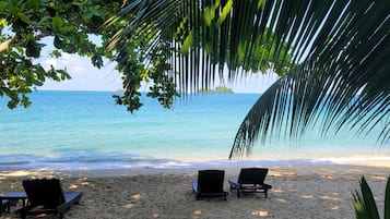 On the beach, kayaking
