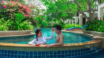 2 outdoor pools, open 7:00 AM to 6:00 PM, pool umbrellas, pool loungers