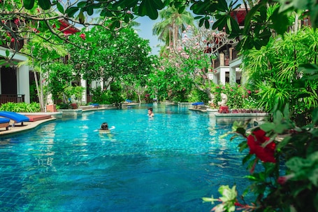 2 outdoor pools, open 7:00 AM to 6:00 PM, pool umbrellas, sun loungers