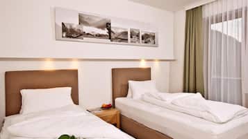 Premium bedding, pillow-top beds, in-room safe, desk