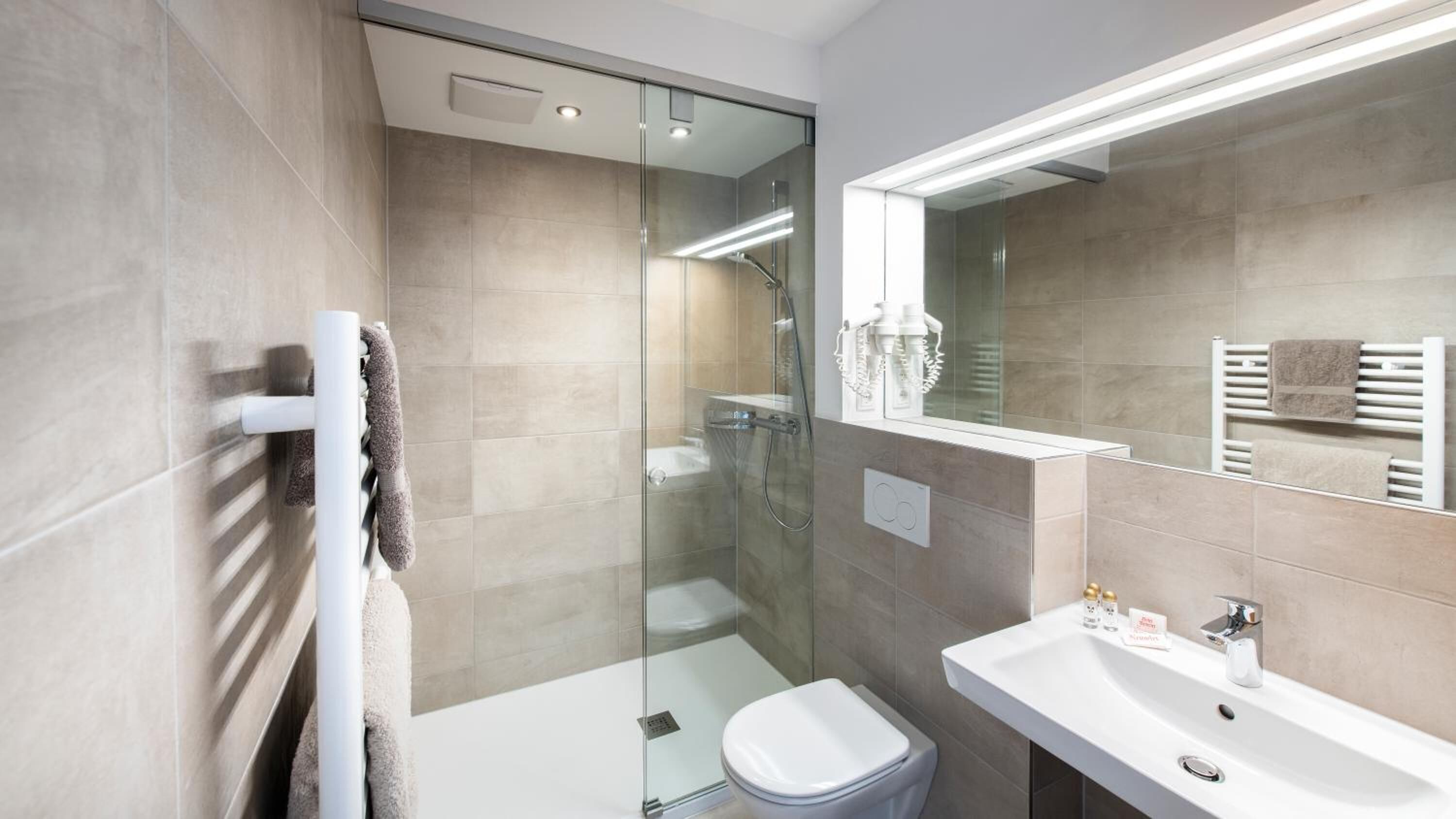 shower, eco-friendly toiletries, hair dryer, bathrobes