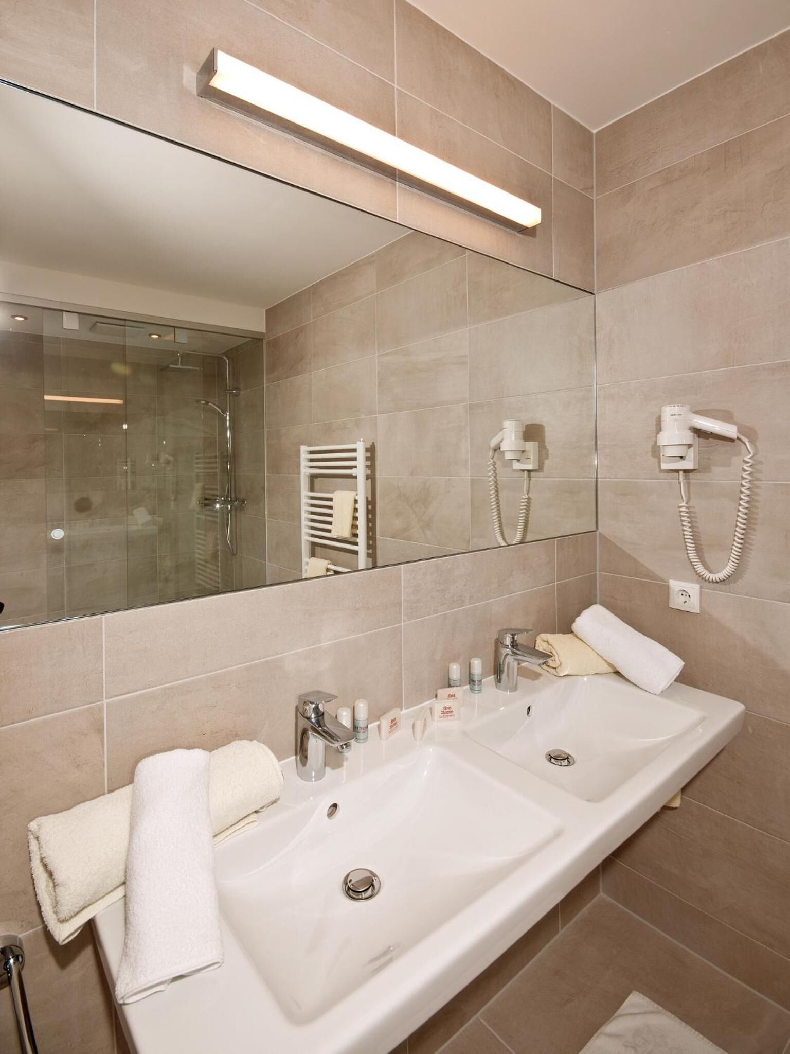 shower, eco-friendly toiletries, hair dryer, bathrobes