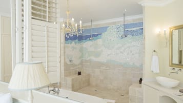 Luxury Suite, 1 King Bed | Bathroom | Separate bathtub and shower, deep-soaking bathtub, designer toiletries