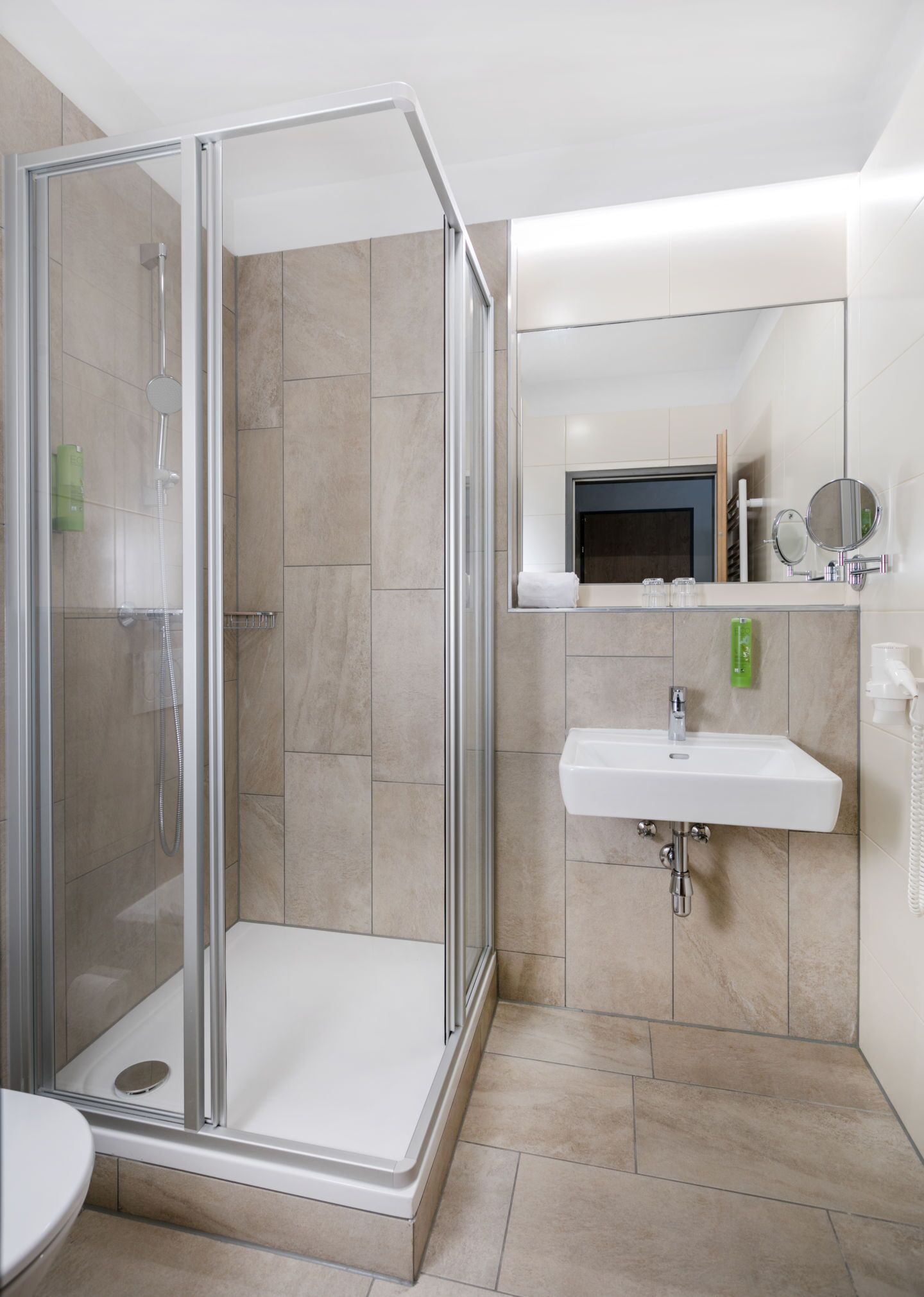 family suite | bathroom | shower, hair dryer, towels