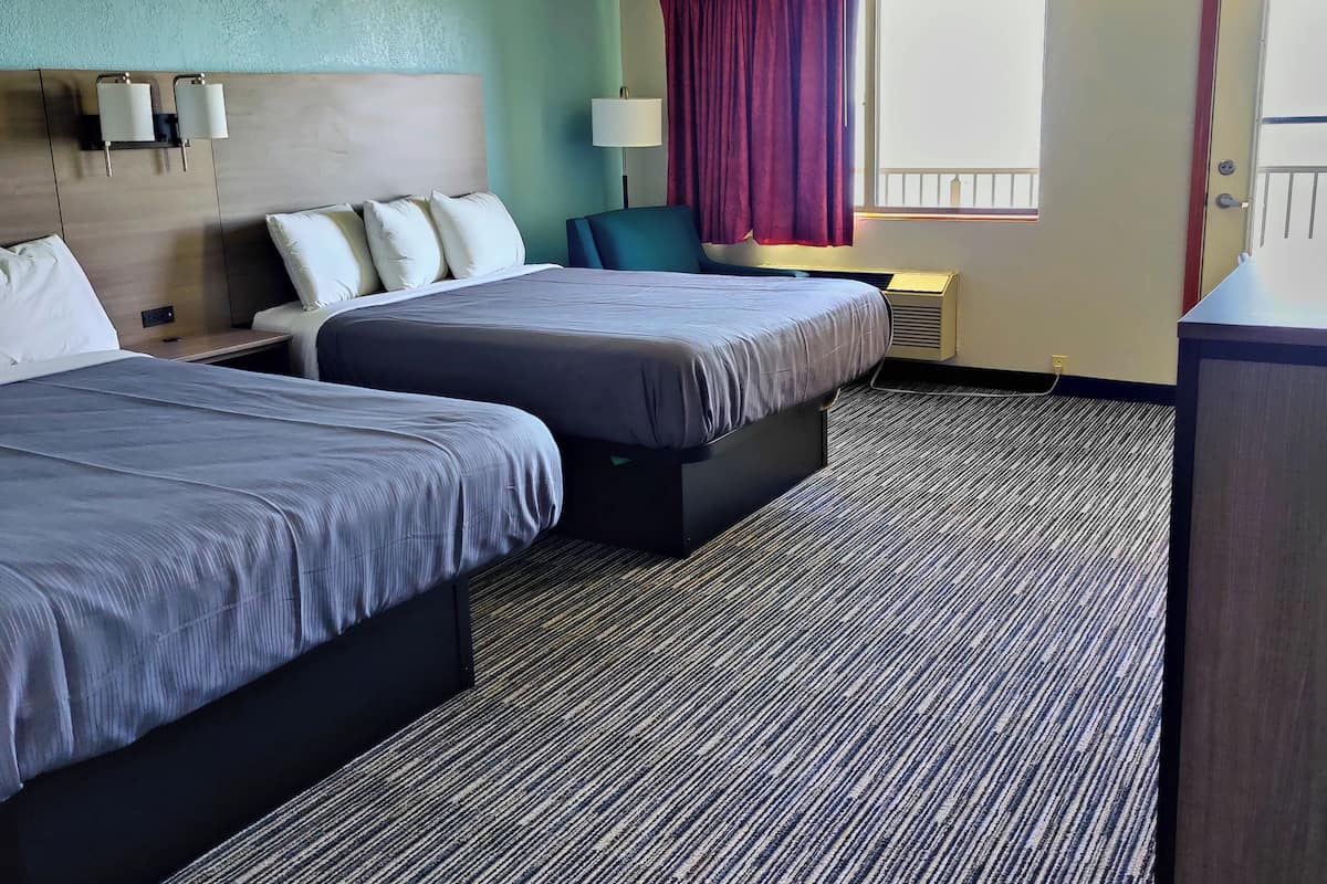 Desk, free WiFi, bed sheets, alarm clocks