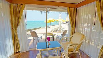 On Beach Premium Bungalow | Living area | LCD TV