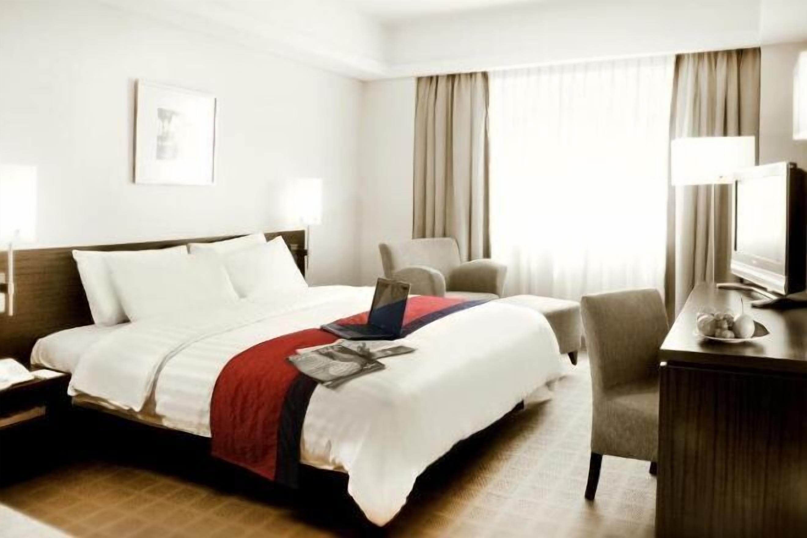 Down comforters, Select Comfort beds, in-room safe, desk