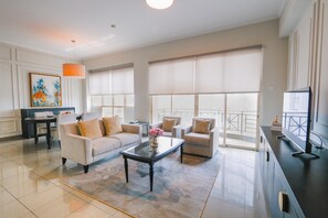 Apartment 3 Bedrooms Suite | Living area | 32-inch LCD TV with cable channels, TV - Java Paragon Hotel and Residences (Surabaya)