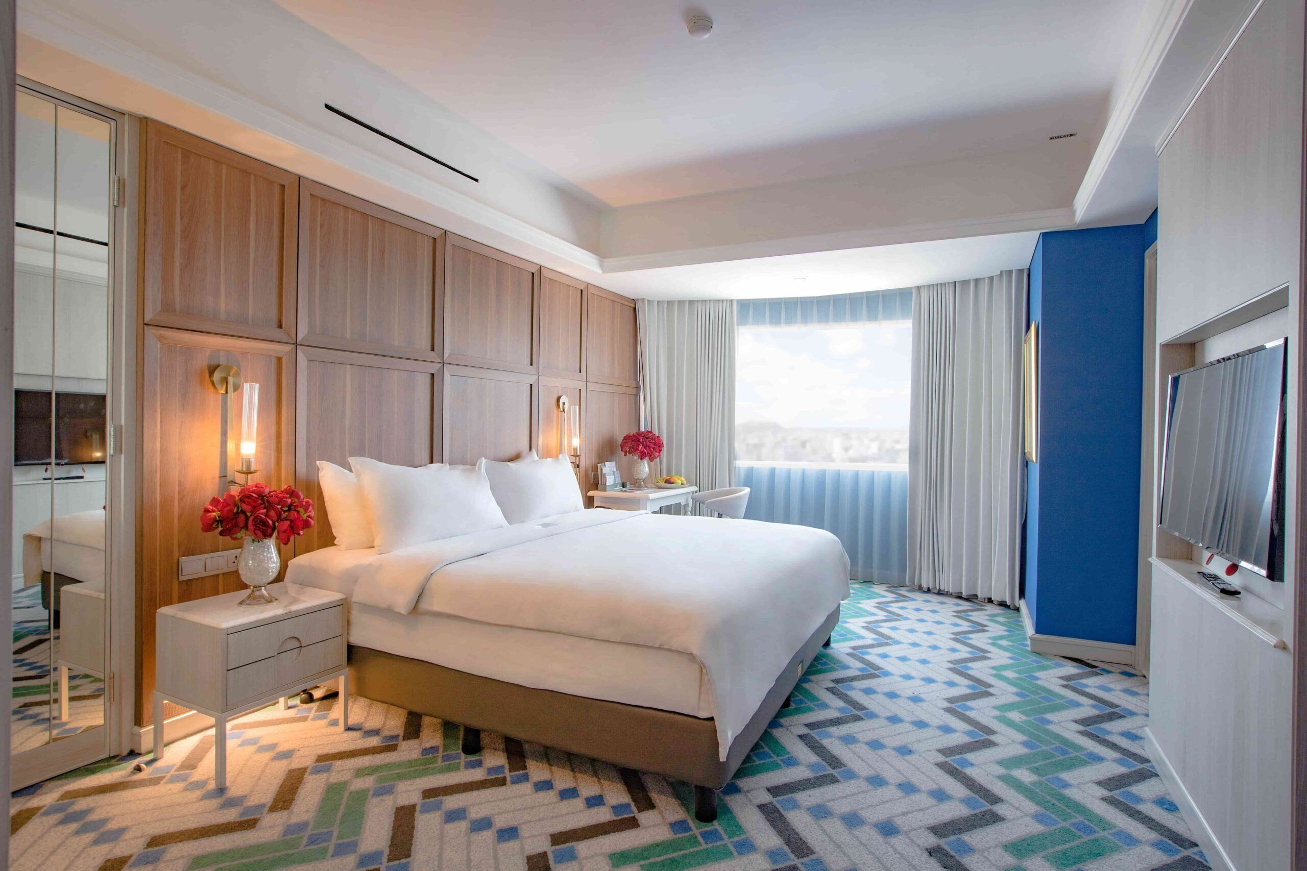 Down duvets, Select Comfort beds, in-room safe, desk