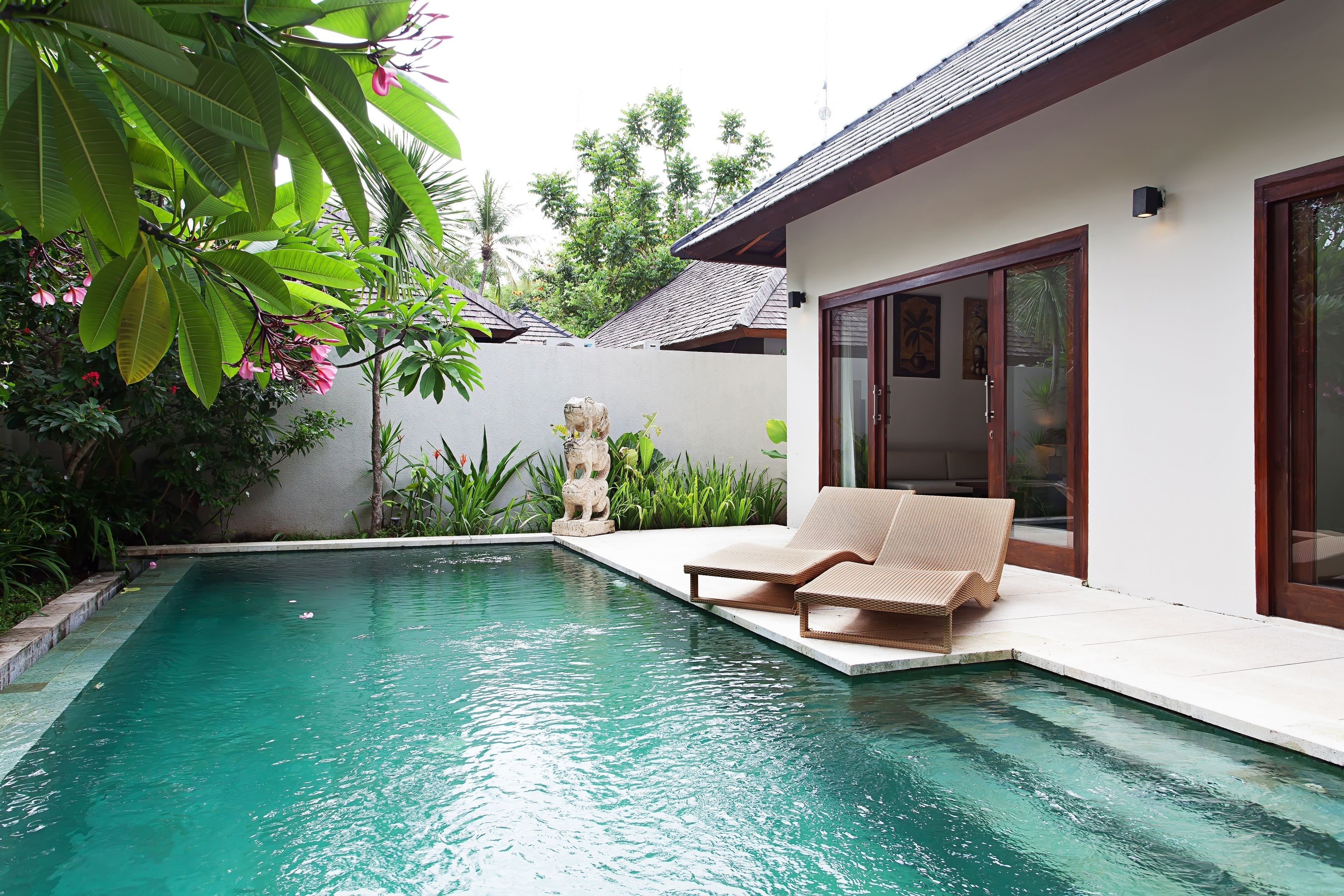 2 outdoor pools, pool umbrellas, pool loungers