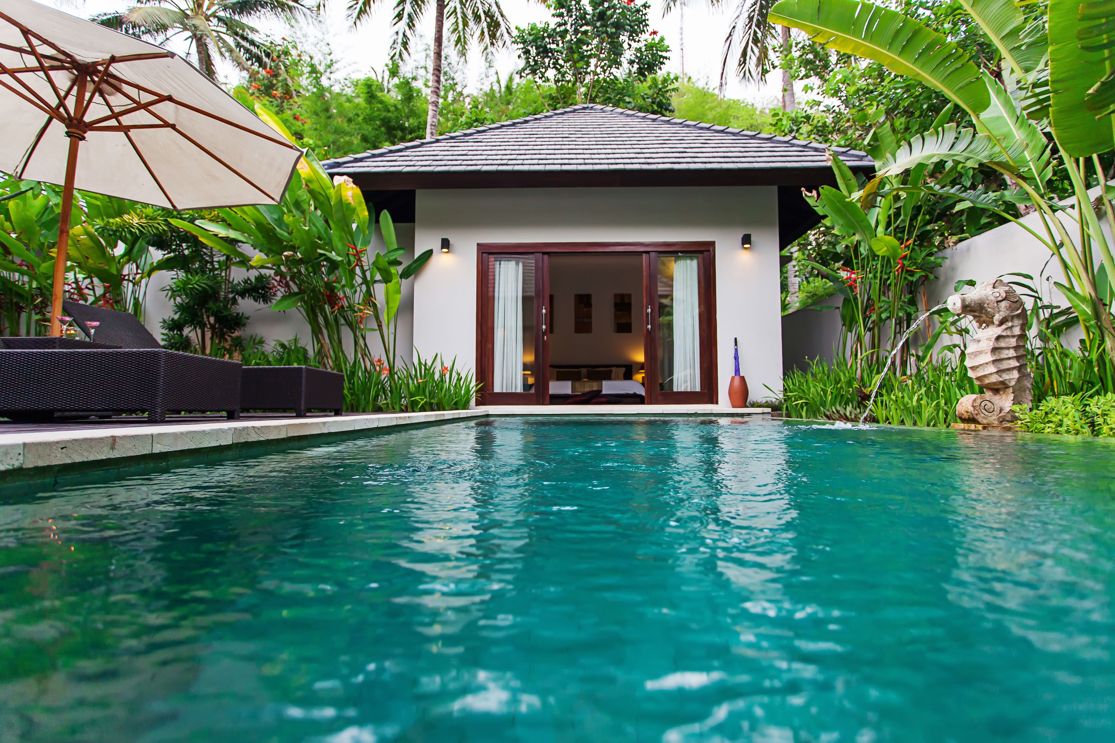 2 outdoor pools, pool umbrellas, pool loungers