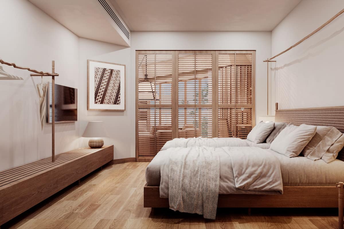 A bedroom with a wooden bed, a bedside table, a TV, and a wall-mounted shelf.
