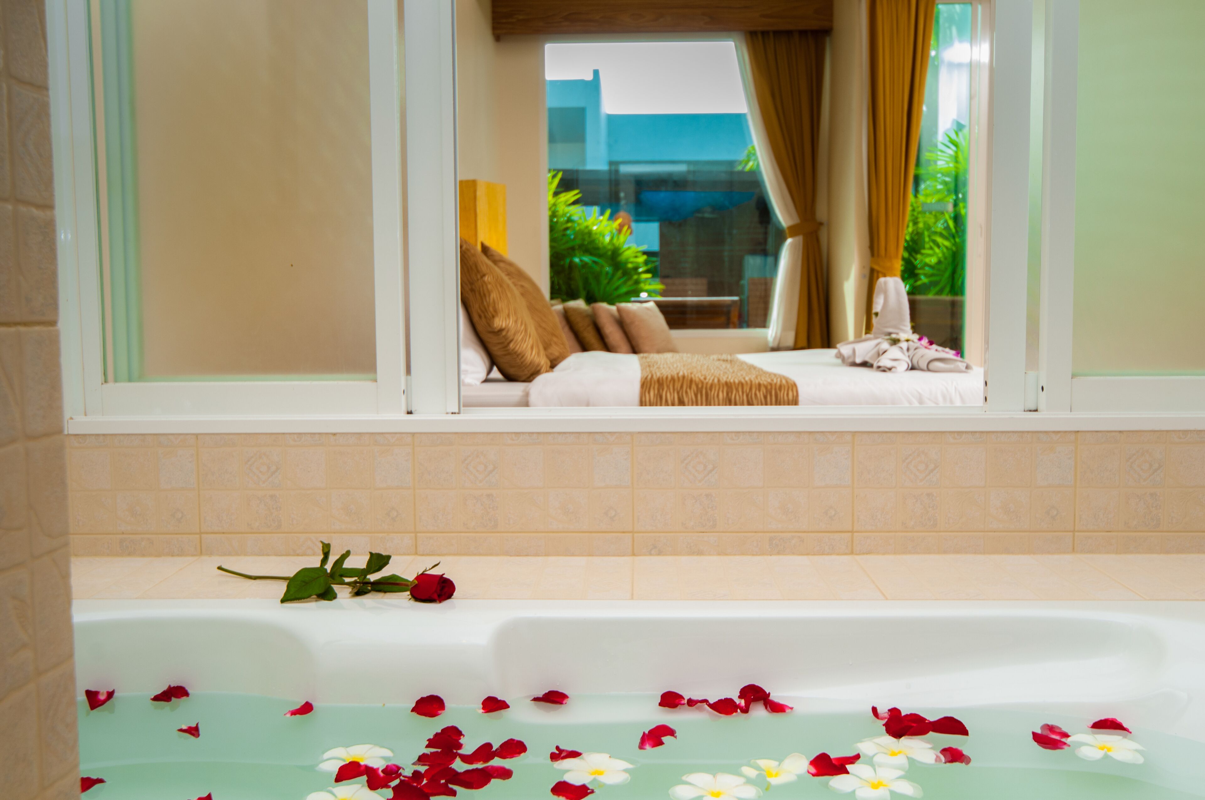 deluxe room, pool access | bathroom | hair dryer, slippers, bidet, towels