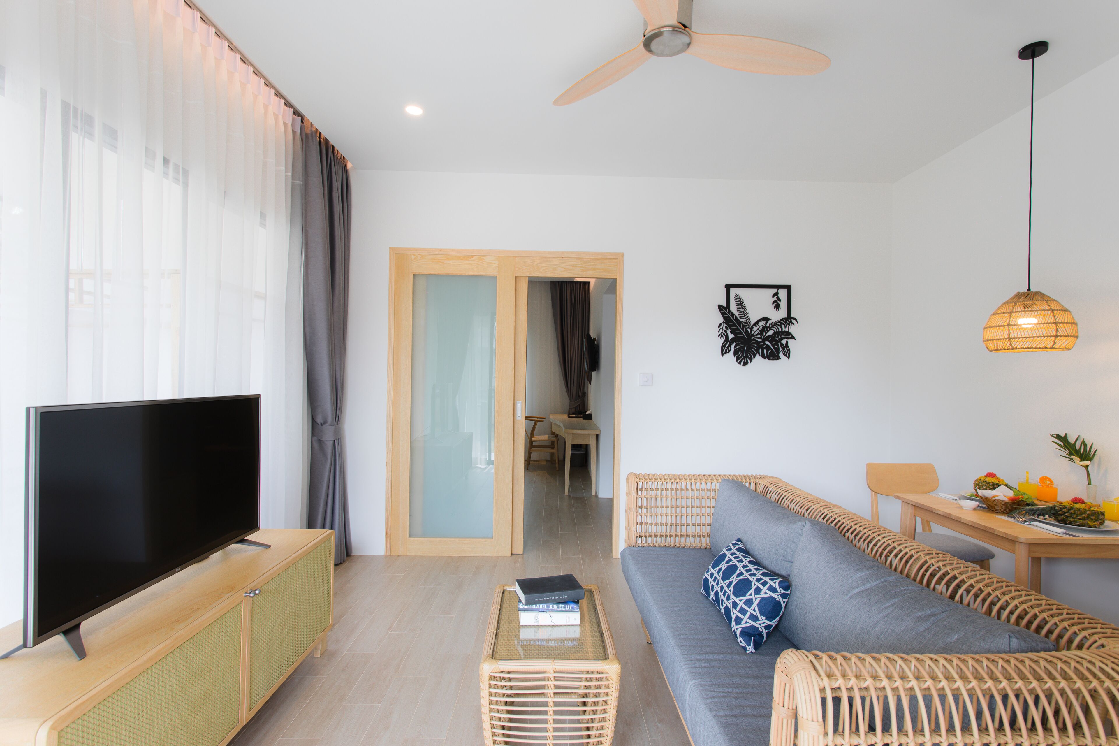 tropical villa suite | living area | flat-screen tv