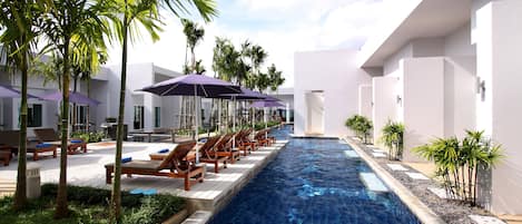 2 outdoor pools, pool umbrellas, pool loungers