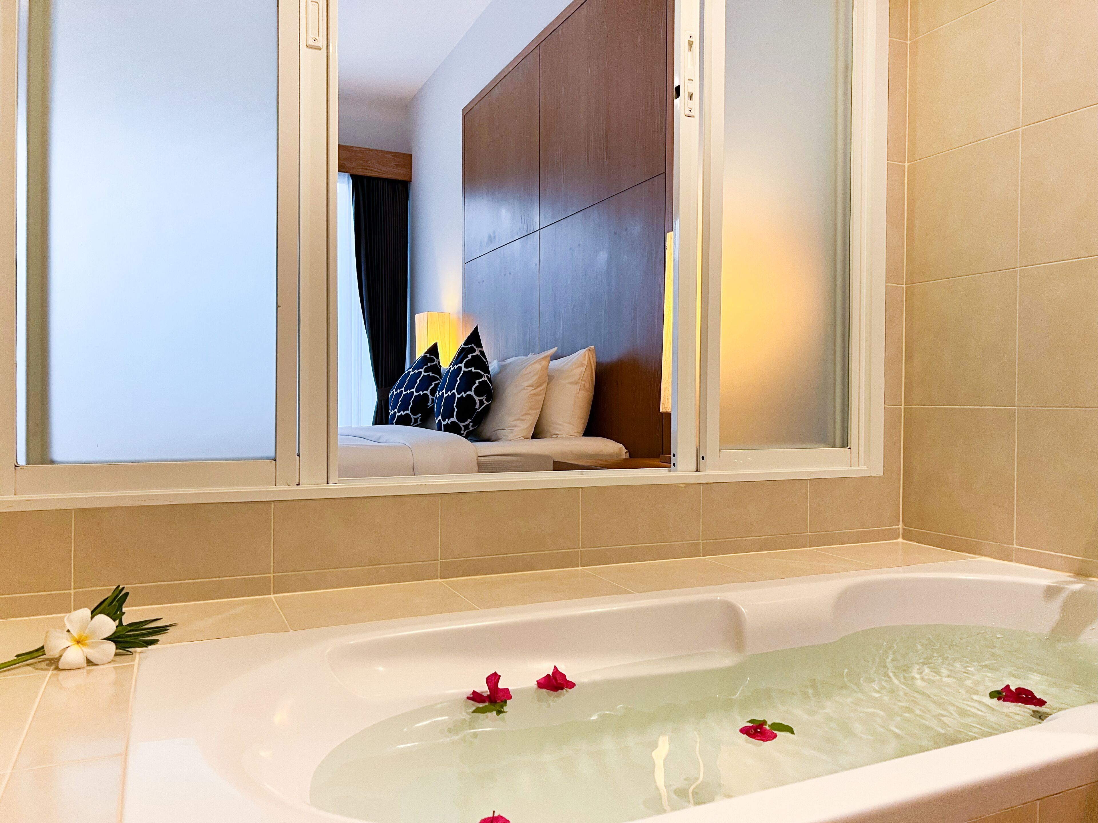 deluxe room, pool access | bathroom | hair dryer, slippers, bidet, towels