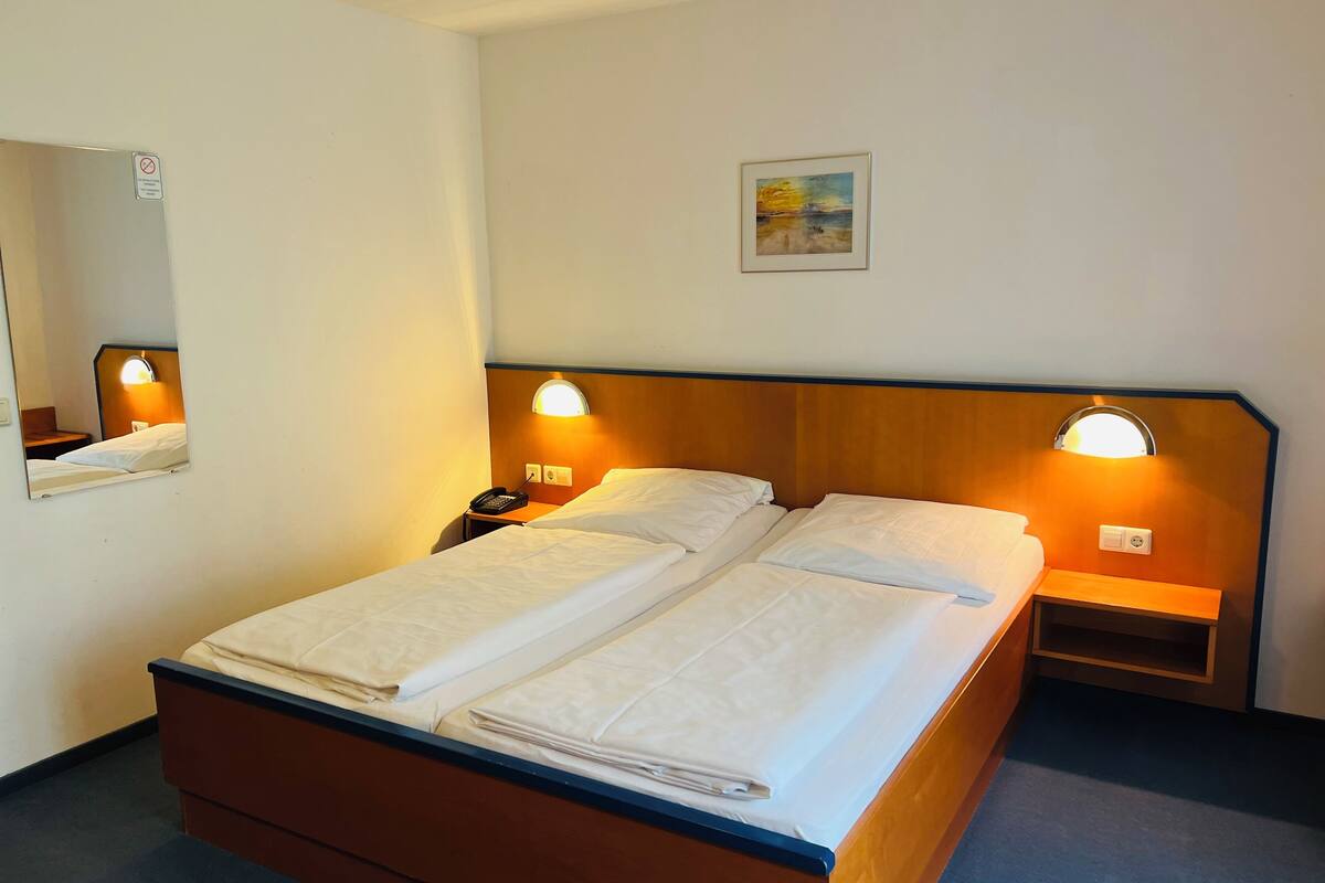 Double Room | Iron/ironing board (on request), WiFi (free), bed sheets