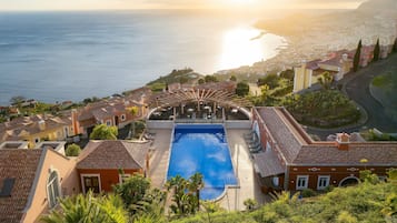 Outdoor pool, pool umbrellas, pool loungers