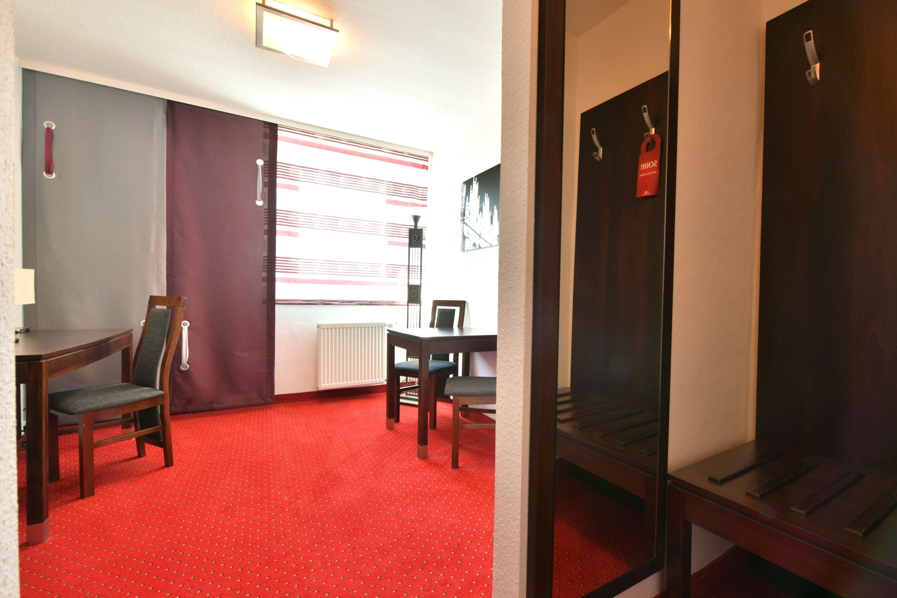 premium room | living area | flat-screen tv