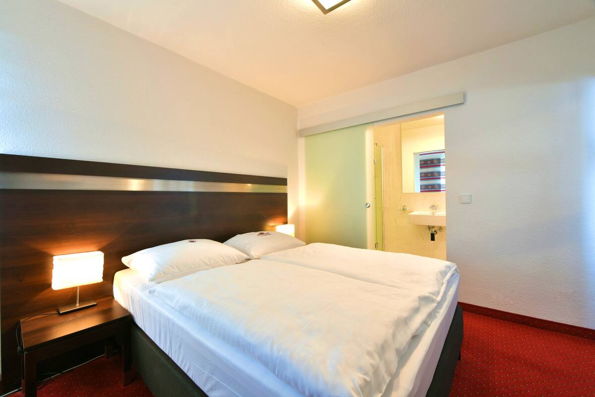 Premium Room | Desk, blackout drapes, WiFi (free), bed sheets