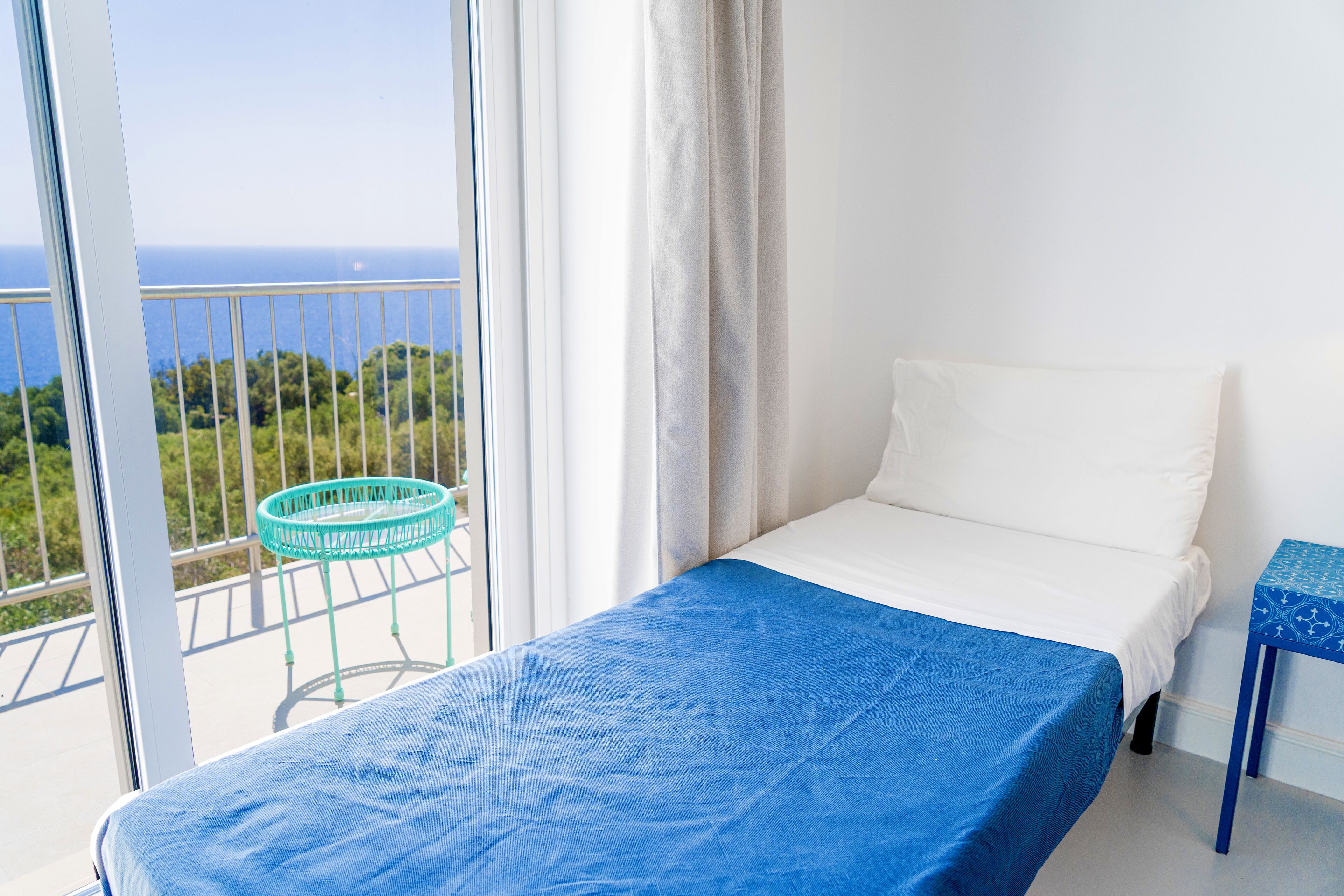 family quadruple room, sea view | 1 bedroom, minibar, in-room safe, individually decorated
