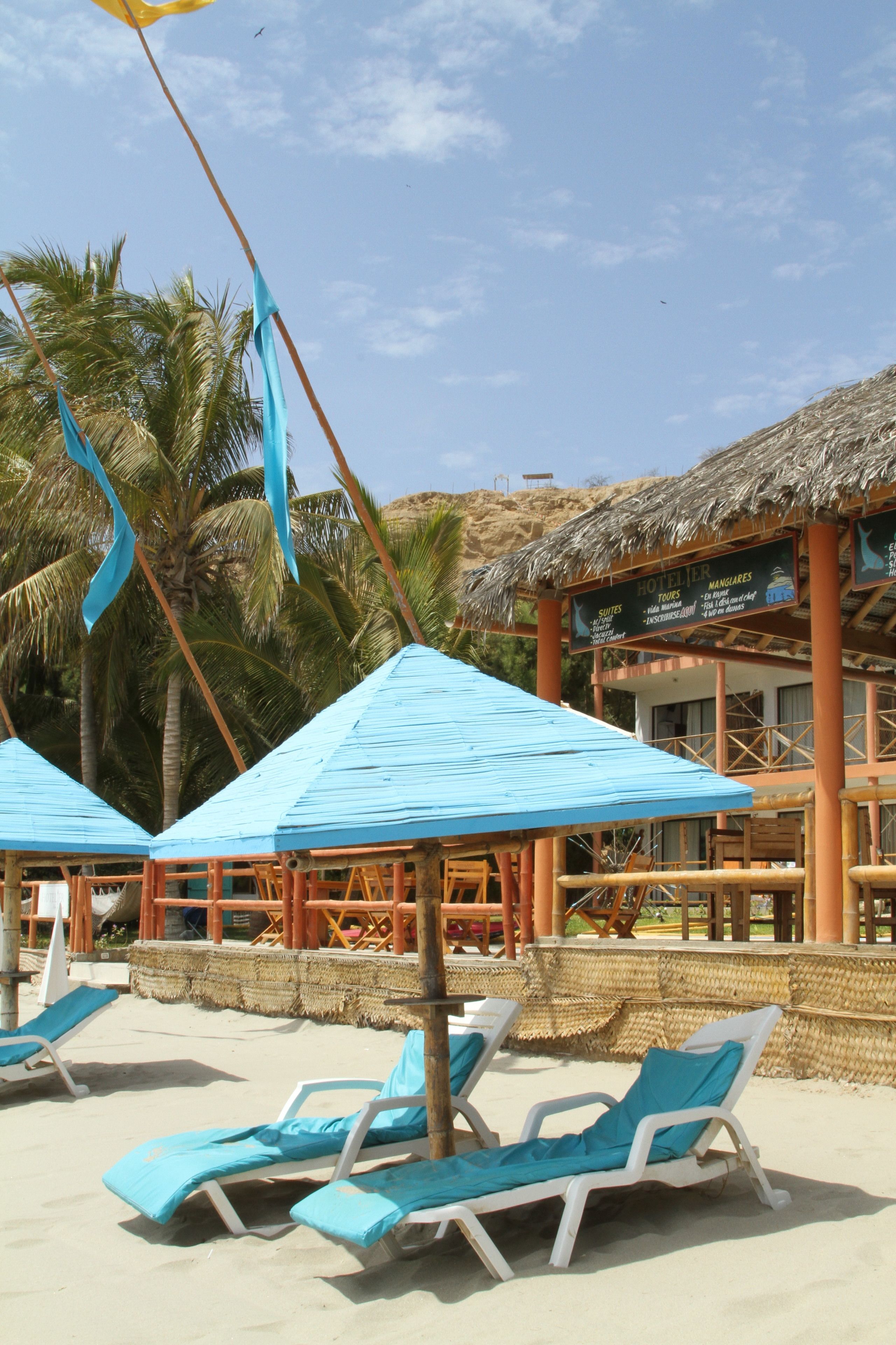 On the beach, sun loungers, beach towels, snorkeling