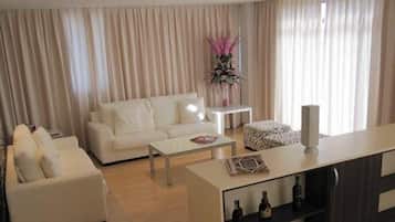 Suite | Sala de estar | Una televisión