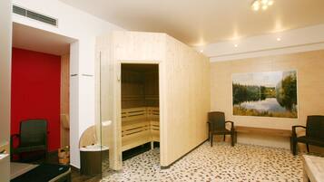 Relax in a serene sauna room with a wooden bench, wicker chairs, and a cushioned bench.