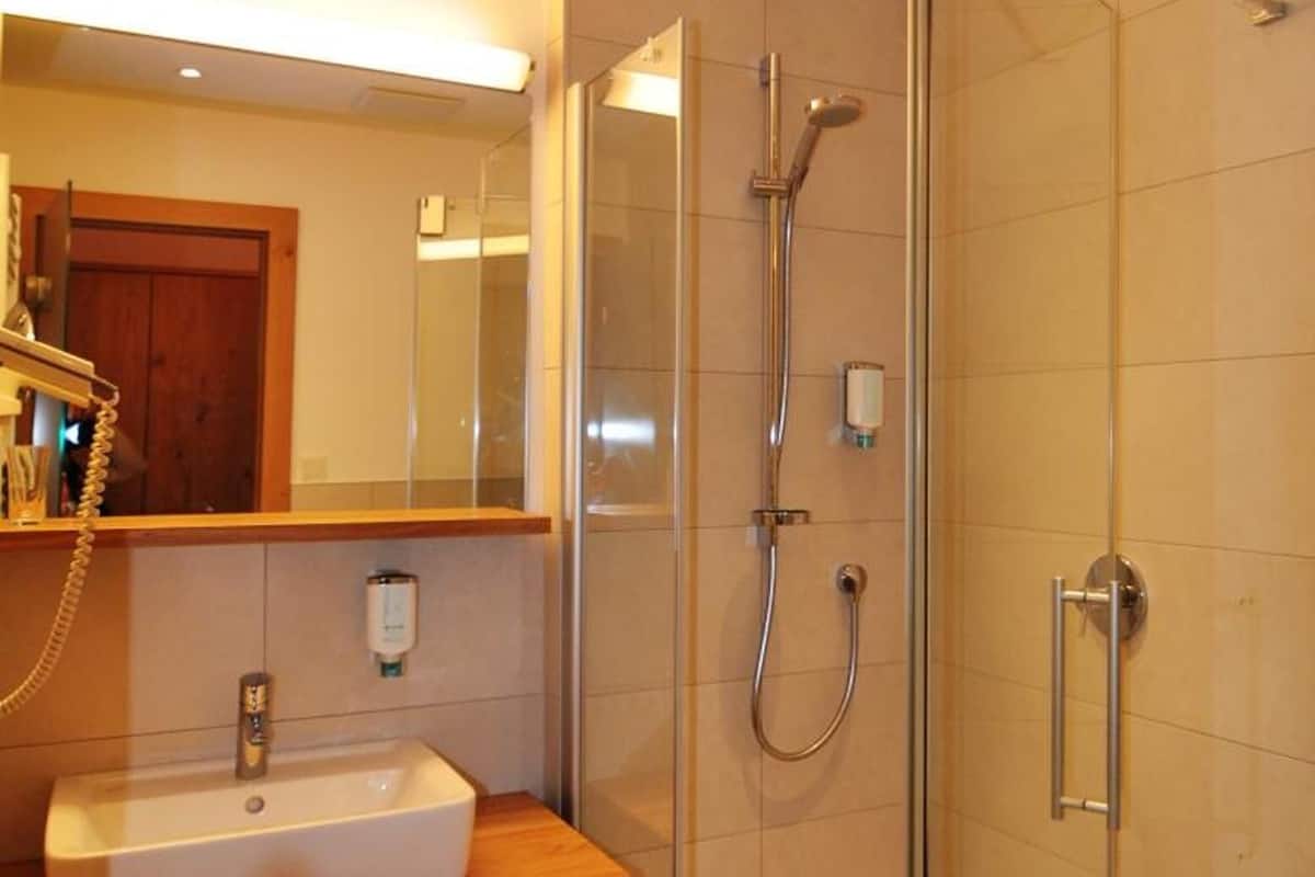 hair dryer, slippers, towels