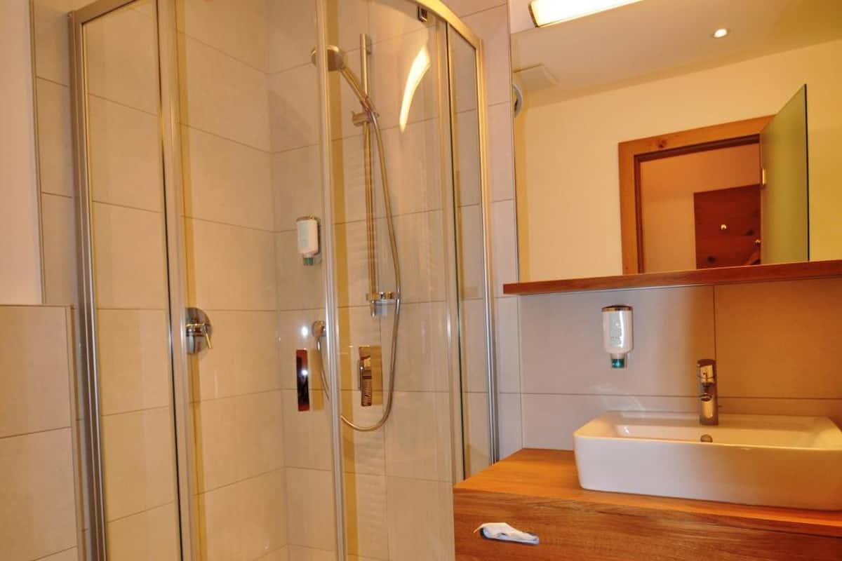 hair dryer, slippers, towels