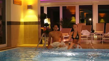 Indoor pool, open 7:00 AM to 11:00 PM, pool loungers
