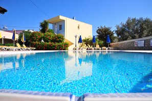 Outdoor pool, pool loungers - Argiro Village (Rhodes)