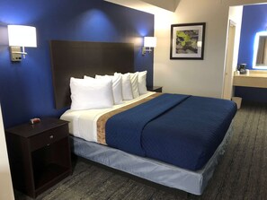 Suite, 1 King Bed | Individually furnished, desk, blackout curtains, iron/ironing board - Executive Inn & Suites Joaquin (Joaquin)