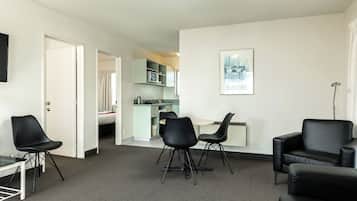 Luxury Apartment, 2 Queen Beds, Partial Ocean View | Living area | 43-inch Smart TV with digital channels, TV