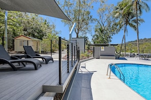 Outdoor pool, pool umbrellas, pool loungers