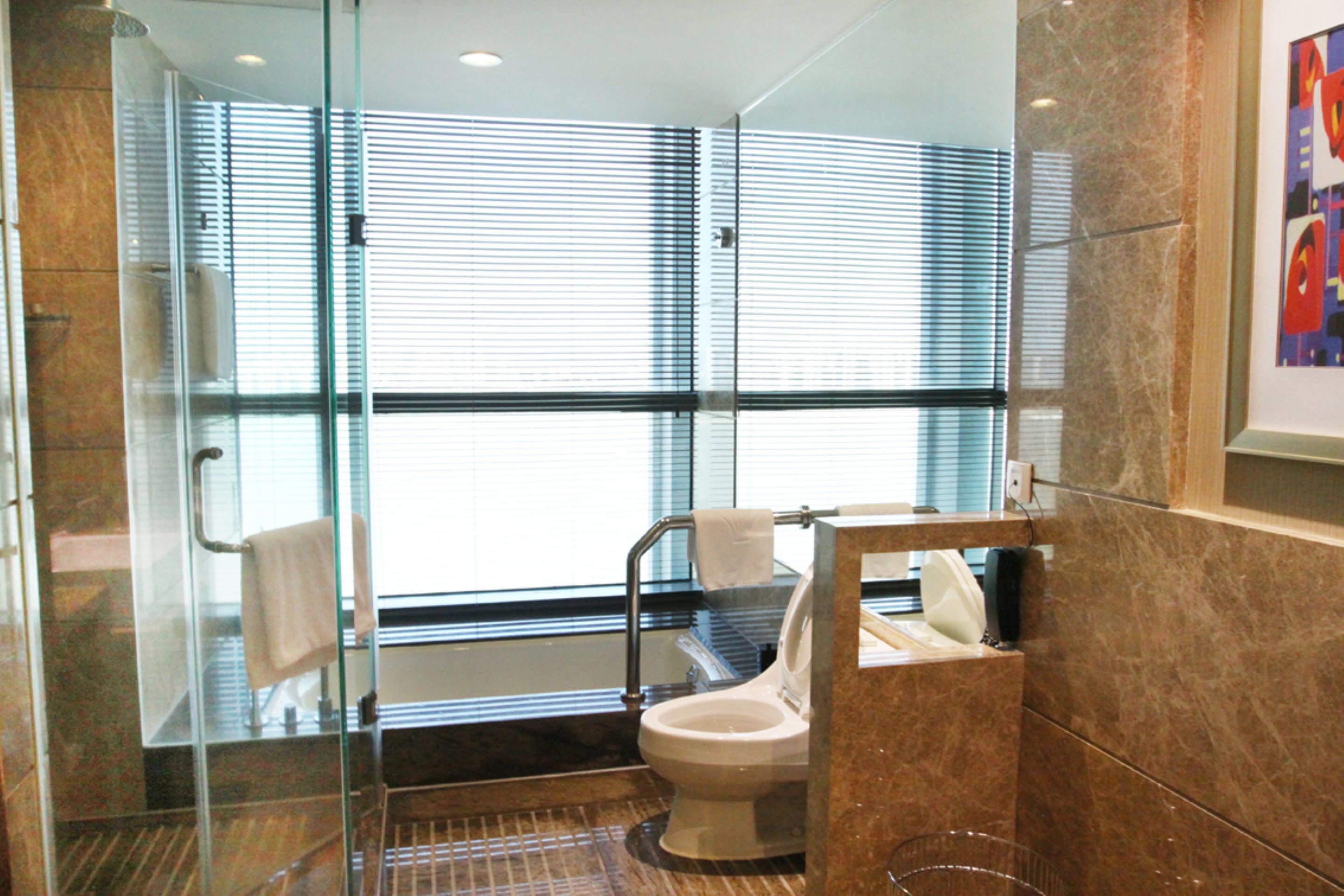 separate bathtub and shower, deep-soaking bathtub, rainfall showerhead