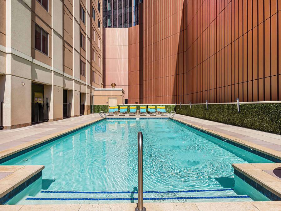 Outdoor pool, open 9:00 AM to 8:00 PM, pool umbrellas, sun loungers