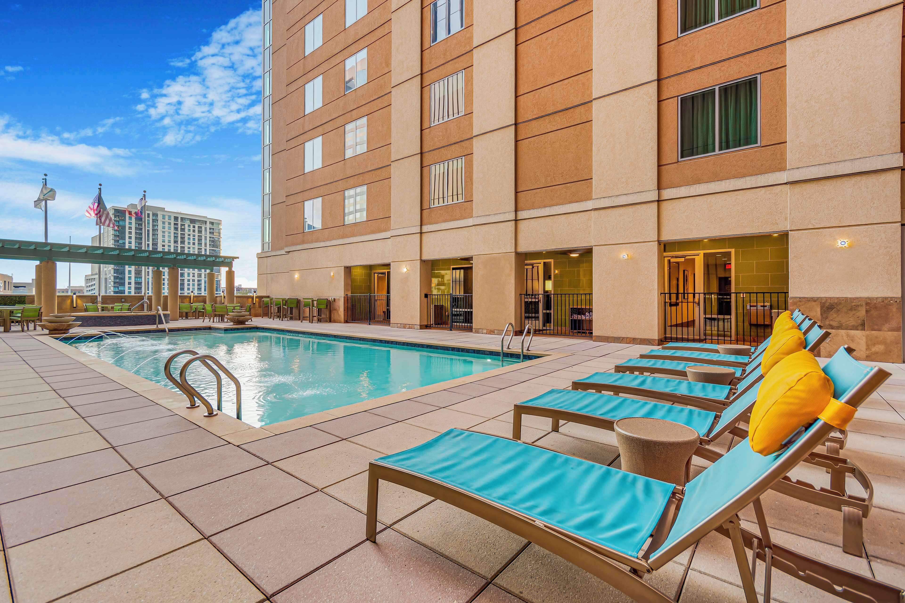 Outdoor pool, open 9:00 AM to 8:00 PM, pool umbrellas, sun loungers