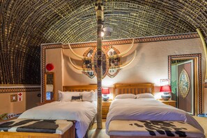 Deluxe Room, 2 Double Beds | In-room safe, individually decorated, individually furnished, desk - aha Lesedi Cultural Village (Muldersdrift)
