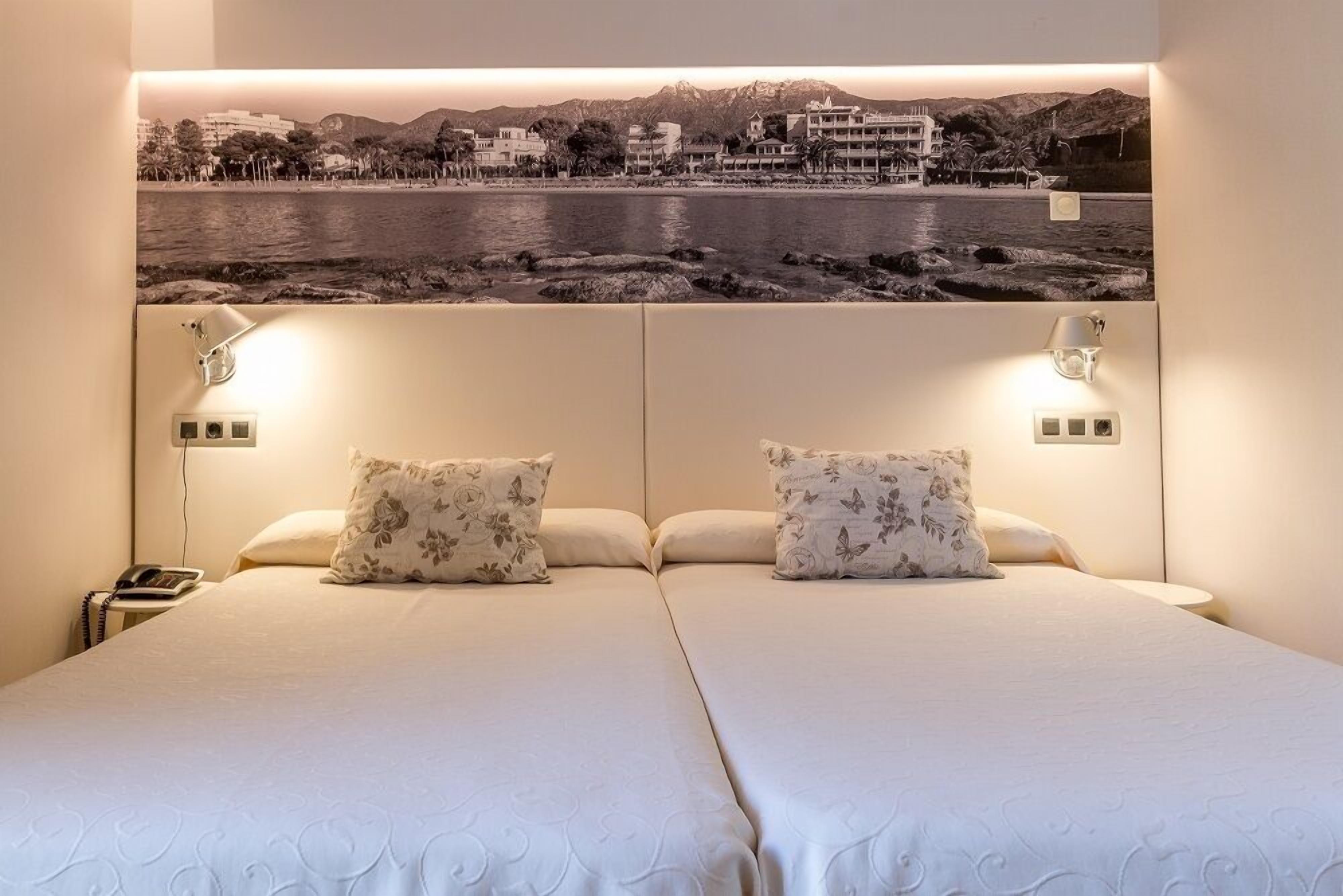 family room with terrace and balcony, partial ocean view | premium bedding, minibar, in-room safe, desk