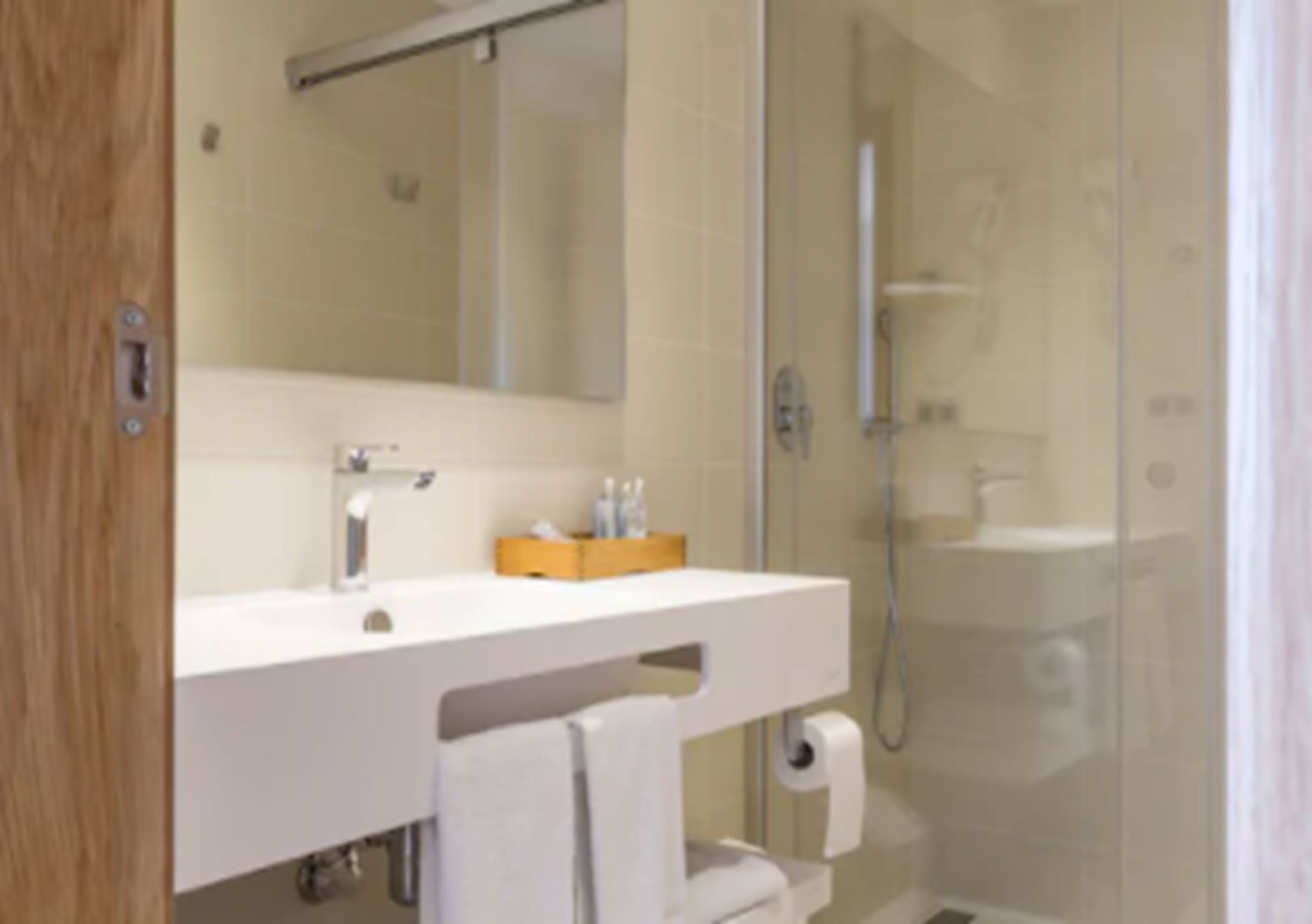 shower, free toiletries, hair dryer, towels