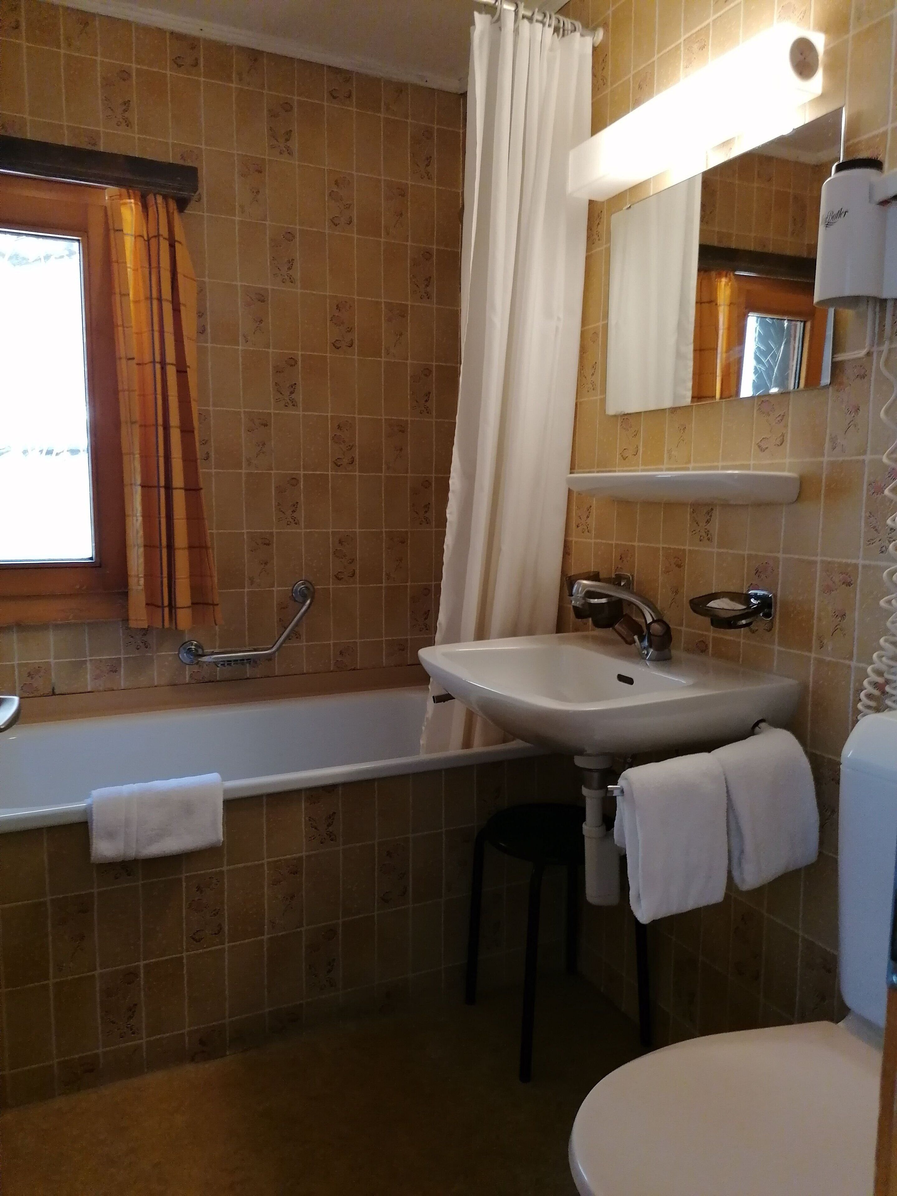Foto - Petit Helvetia Budget Hotel