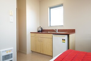 One Bedroom Unit | Private kitchen | Fridge, microwave, coffee/tea maker, electric kettle