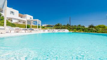 Seasonal outdoor pool, open 9 AM to 9 PM, pool umbrellas, sun loungers