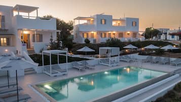 Seasonal outdoor pool, open 9 AM to 9 PM, pool umbrellas, sun loungers