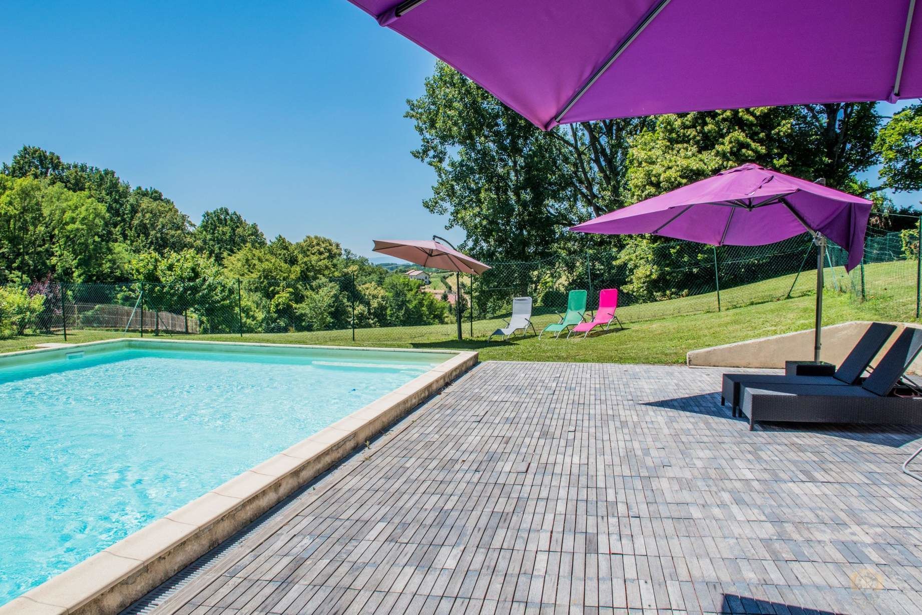 outdoor pool, pool umbrellas, pool loungers