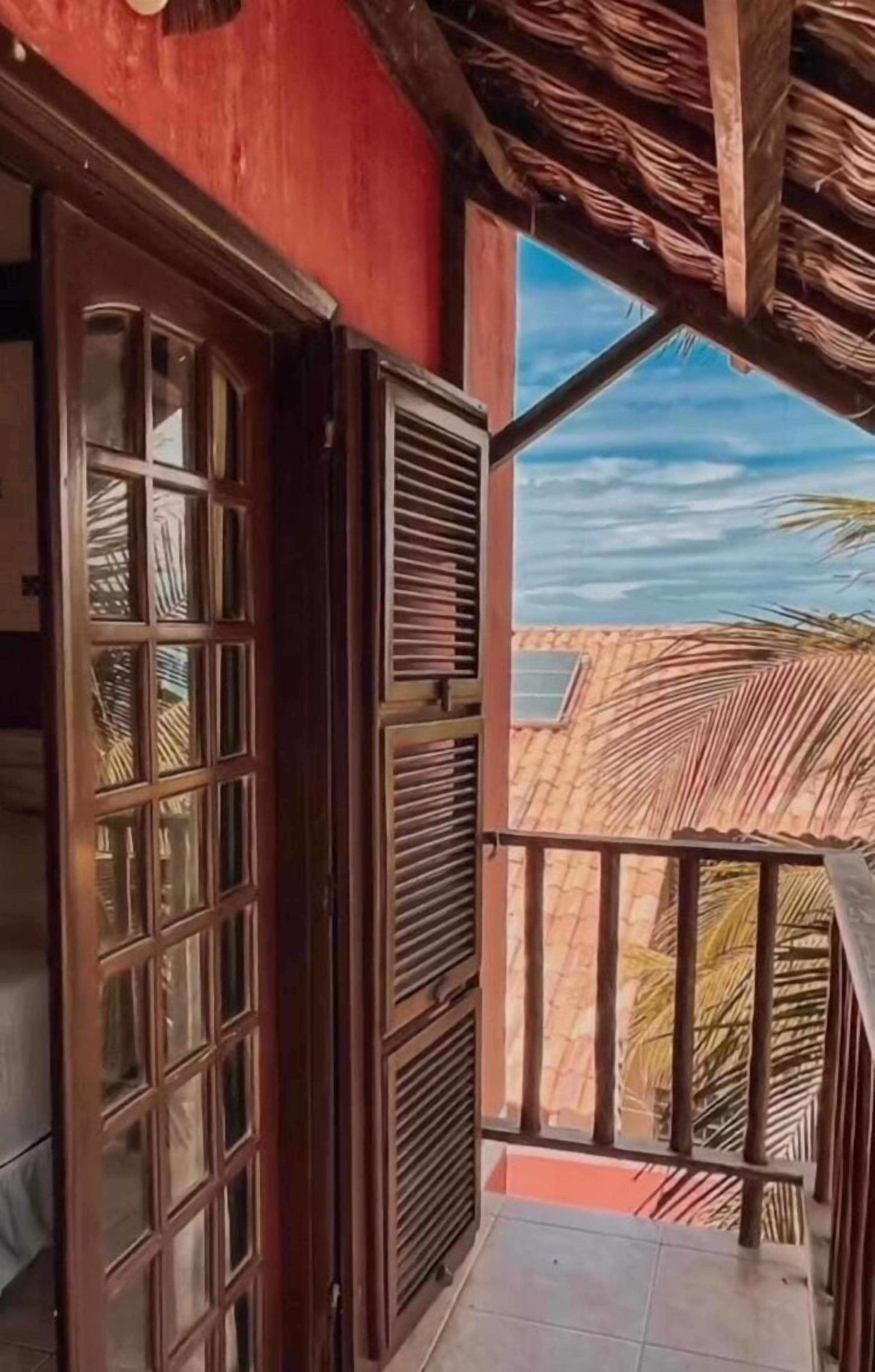 Apartamento luxo, vista para a piscina | Vista do quarto