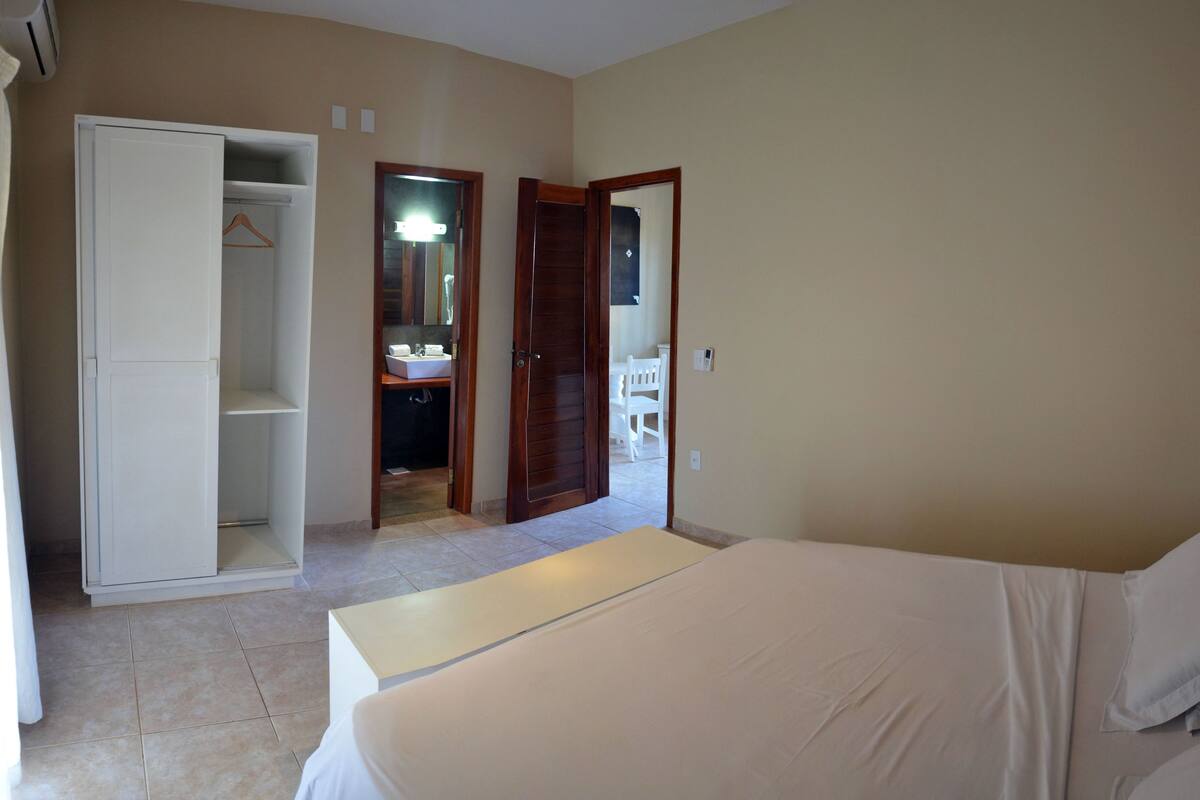 deluxe apartment, pool view | 1 bedroom, in-room safe, desk, laptop workspace